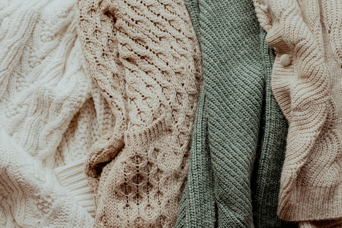 Folded knitwear in neutral tones