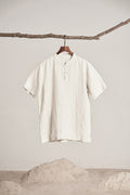 White linen shirt hanging in daylight